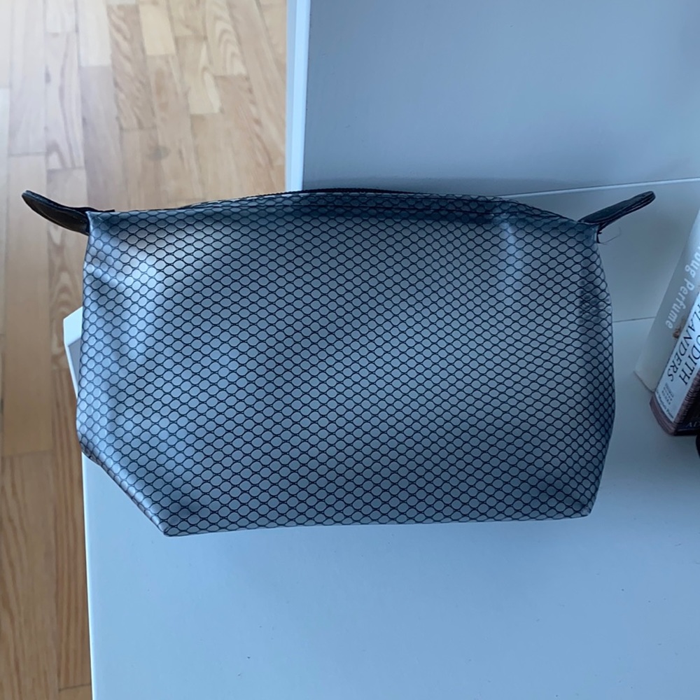 Black and white plastic makeup bag